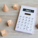 電卓にPRICEの文字の画像